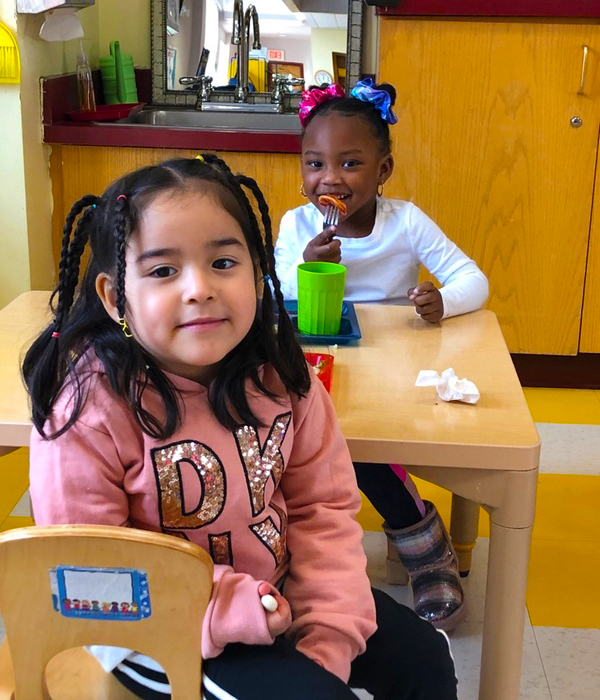 Montessori students smiling